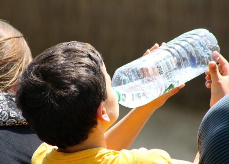 boy drinking from bottle 738210 960 720 2