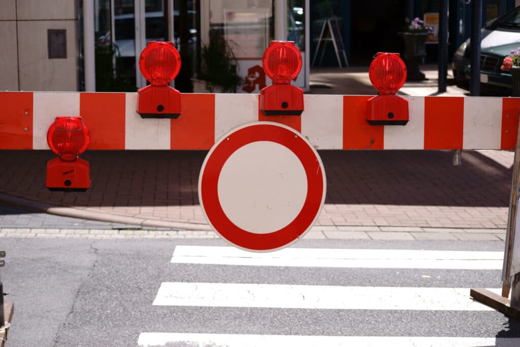 a road barrier with signal lights on a pedestrian 2026 03 26 08 03 22 utc scaled 1