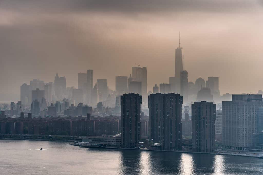 lower manhattan skyline on a foggy afternoon today 2026 03 15 23 25 43 utc