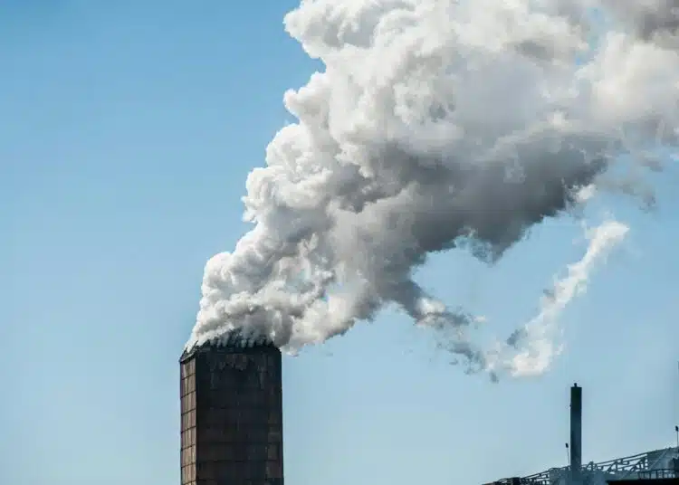 smoke from a pipe factory polluting air environmental problems