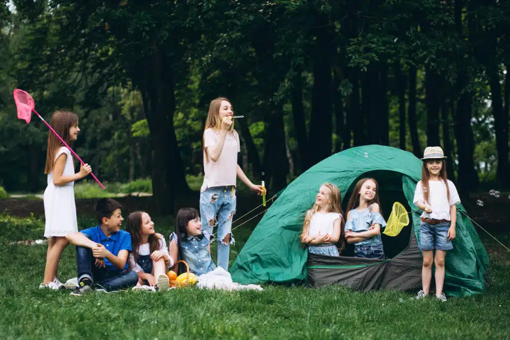 group teens camping forest 9ea49761