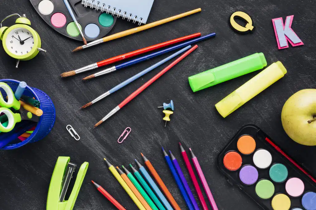 multicoloured messy stationery grey background 73002624