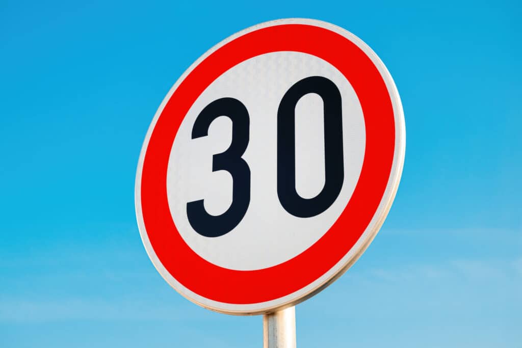 speed limit thirty road sign against a clear blue 2026 05 11 23 59 22 utc scaled 1